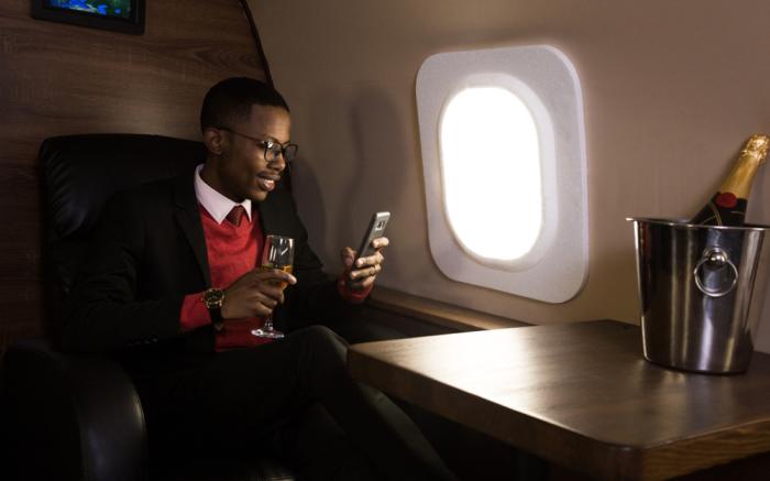 A happy millionaire enjoying the fruits of his labor.